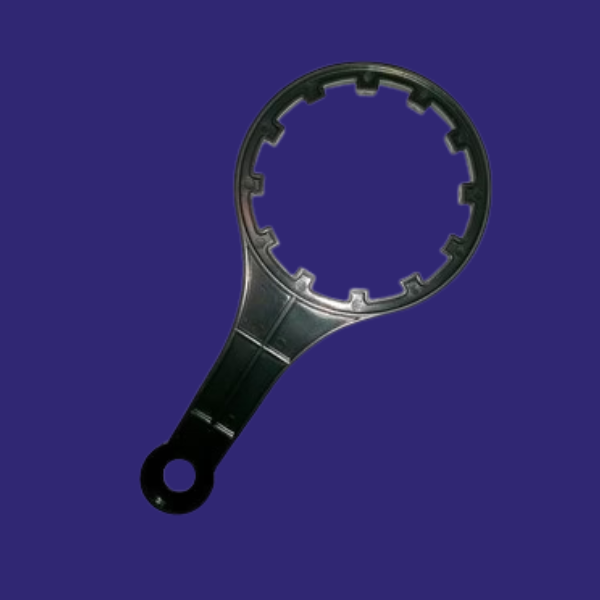 Clé de serrage pour corps de membrane